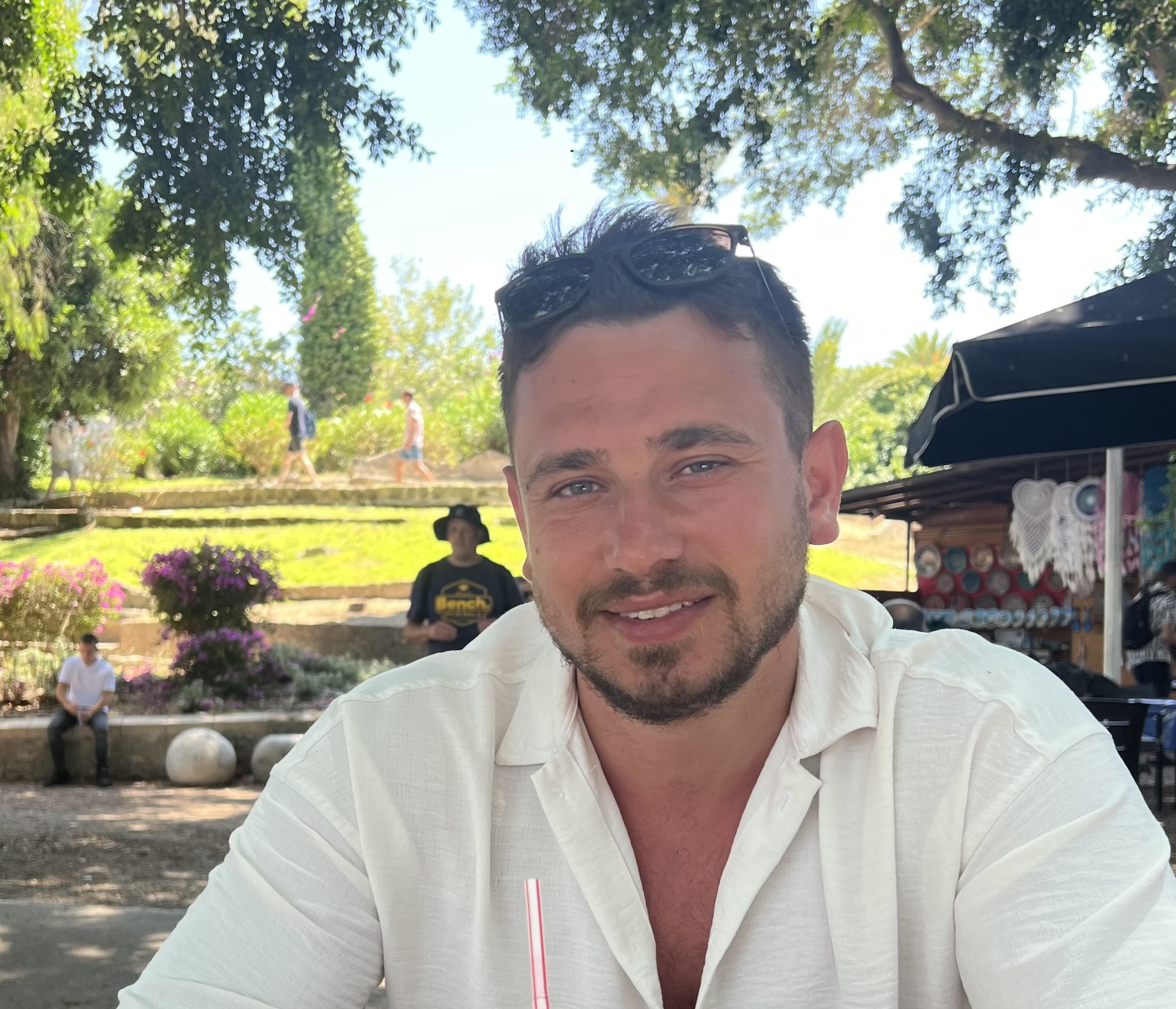 Burak Karaman smiling outdoors